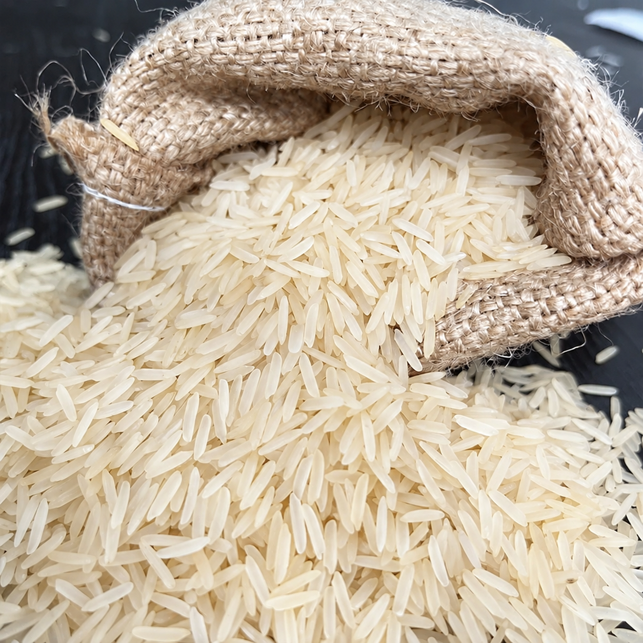 Illustrative Creamy Sella grains in a jute sack